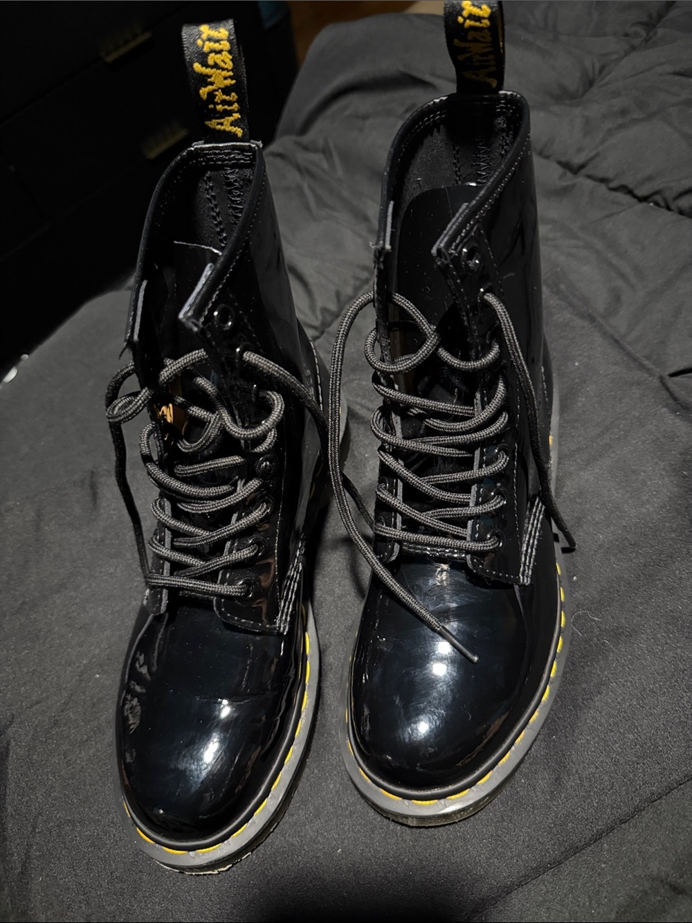Dr. Martens Black Patent Lace-Up Boots with Yellow Stitching